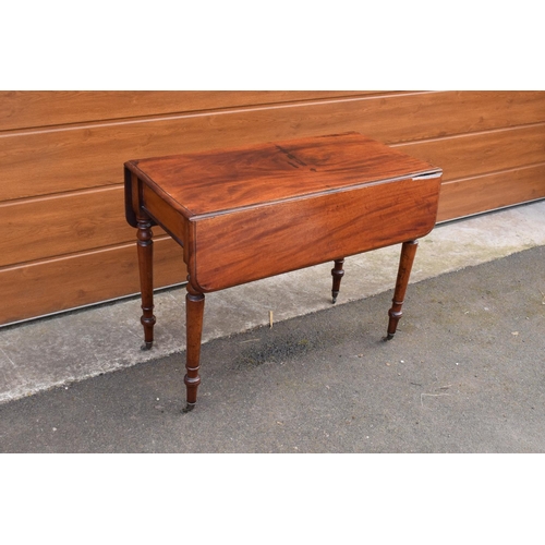 289 - Late 19th century mahogany Pembroke table on casters with a single hidden draw. In good functional c... 