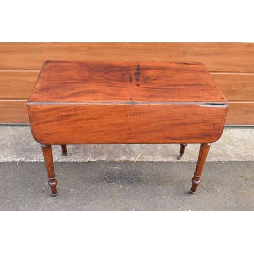 289 - Late 19th century mahogany Pembroke table on casters with a single hidden draw. In good functional c... 