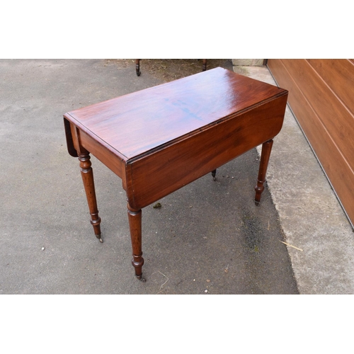 289 - Late 19th century mahogany Pembroke table on casters with a single hidden draw. In good functional c... 