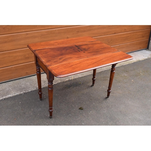 289 - Late 19th century mahogany Pembroke table on casters with a single hidden draw. In good functional c... 