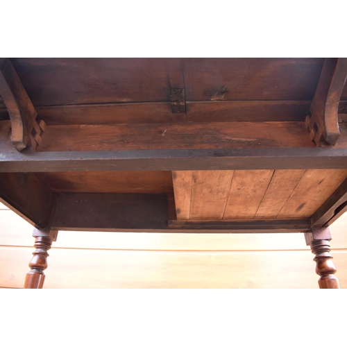 289 - Late 19th century mahogany Pembroke table on casters with a single hidden draw. In good functional c... 