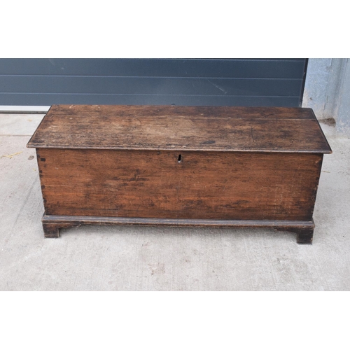 299 - An early 19th century oak chest/ blanket box with a lift up lid. 121 x 44 x 47cm. In good condition ... 