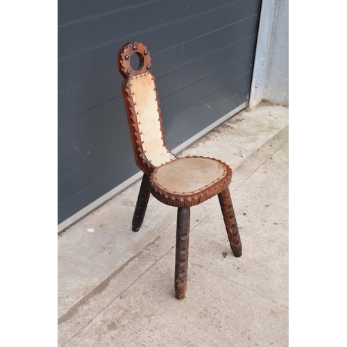 301 - 20th century wooden chair with three legs upholstered with cows hair style fabric. Unusual piece in ... 