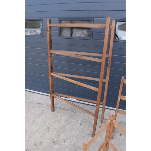 313 - A collection of vintage folding clothes stands for laundry/ drying out etc. 2 fold. 1 is more modern... 