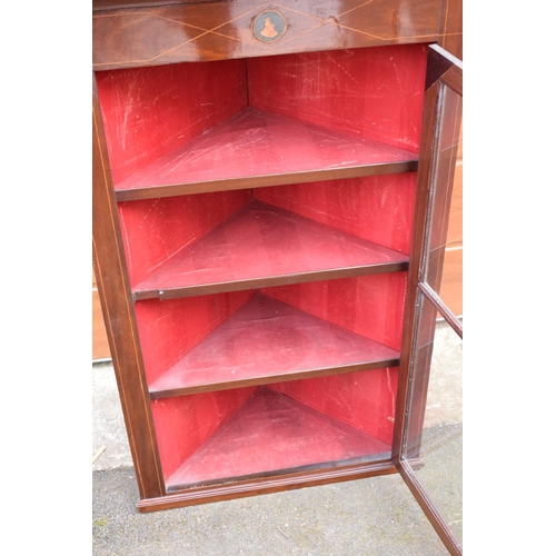 317 - 19th century inlaid corner cabinet with a astral-glazed door. 69 x 35 x 113cm.