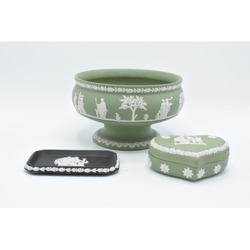 59 - A collection of Wedgwood jasperware to include a sage green footed bowl, a heart shaped trinket box ... 