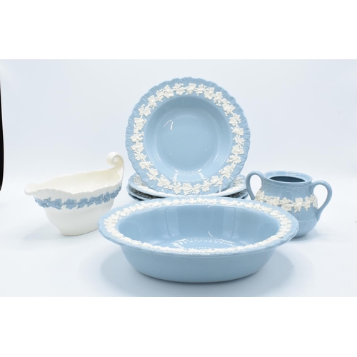 63 - Wedgwood Embossed Queen's Ware to include a sugar pot (no lid), 4 8 1/4 '' bowls and an oval vegetab... 