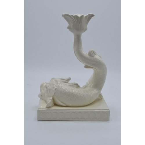 68 - Wedgwood and Bentley cream ware dolphin candlestick. In good condition with no obvious damage or rep... 