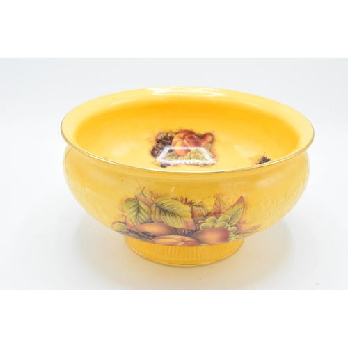 74 - Aynsley Orchard Gold footed bowl in a deeper gold/orange colour. In good condition with no obvious d... 