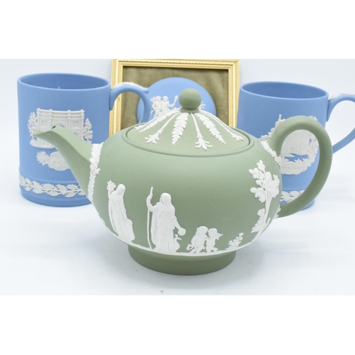 76 - A collection of Wedgwood Jasper ware to include a lilac vase/ table lighter, a sage green teapot (sp... 