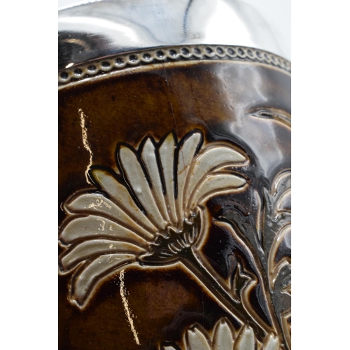 89 - Doulton Lambeth floral loving cup with a hallmarked silver rim by Florence Barlow, with marks to bas... 