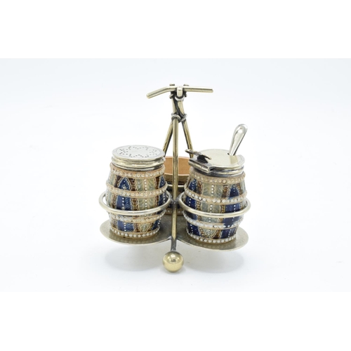 90 - Doulton Lambeth three-piece stoneware cruet set with a silver plated stand with marks to base, 'AS' ... 