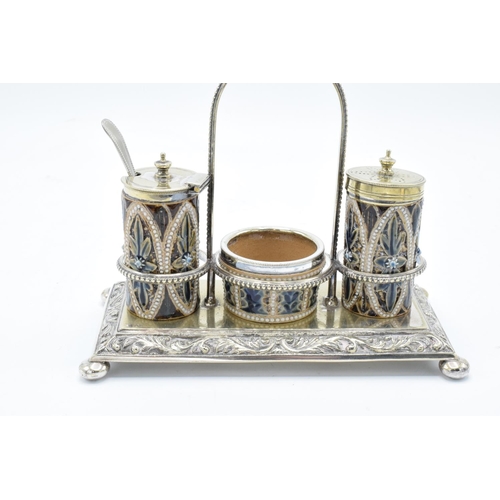 91 - Doutlon Lambeth 3 piece stoneware cruet set with a silver plated stand, circa 1876 with marks to bas... 