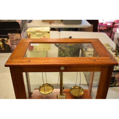 175 - A set of laboratory scales in a wooden case made by Philip Harris and Co Ltd. In good condition. Sol... 