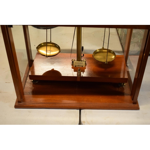 175 - A set of laboratory scales in a wooden case made by Philip Harris and Co Ltd. In good condition. Sol... 