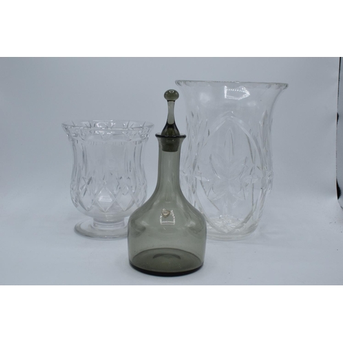 179 - A pair of lead crystsal glass vases together with a Orrefors smoky glass decanter (3). In good condi... 