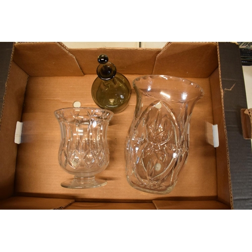 179 - A pair of lead crystsal glass vases together with a Orrefors smoky glass decanter (3). In good condi... 