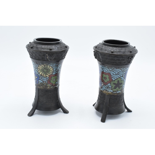 183 - A pair of art-nouveau metal vases each on tri-legs with cloisonné style decoration. Signs of wear an... 