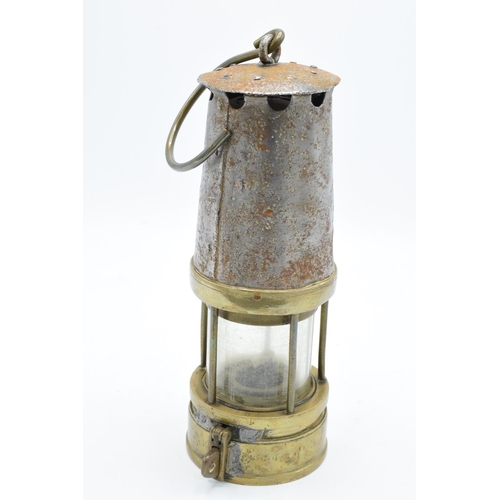 191 - Johnson Clapham and Morris brass minors lamp. Some signs of wear and tear as expected. 24cm tall.