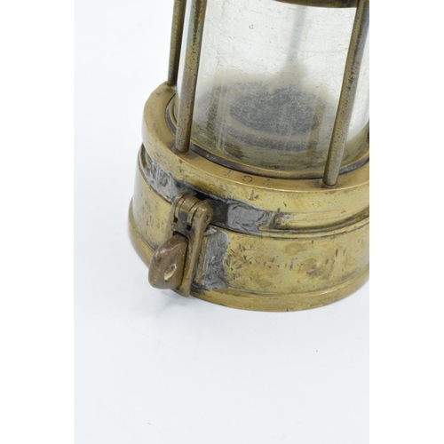 191 - Johnson Clapham and Morris brass minors lamp. Some signs of wear and tear as expected. 24cm tall.