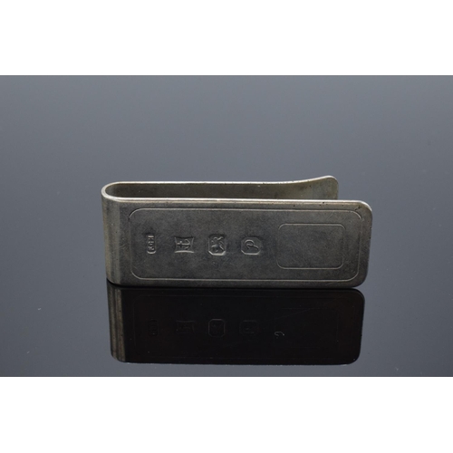 238 - Hallmarked silver money clip (Birmingham 1989). 17.3 grams. Harrison Brothers & Howson Ltd. In good ... 