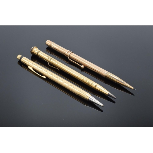 250G - A collection of gold plated propelling pencils to include makers such as Eversharp x 2 and Maxim. AL... 