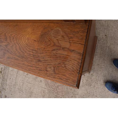 331 - Edwardian/ 20th century golden oak book case with glass doors. In good condition with age related we... 