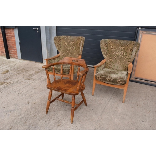 333 - A pair of Parker Knoll winged back chairs together with a reproduction captains chair. 95cm tall. As... 