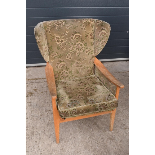 333 - A pair of Parker Knoll winged back chairs together with a reproduction captains chair. 95cm tall. As... 