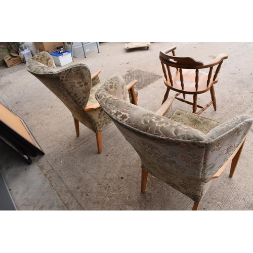 333 - A pair of Parker Knoll winged back chairs together with a reproduction captains chair. 95cm tall. As... 