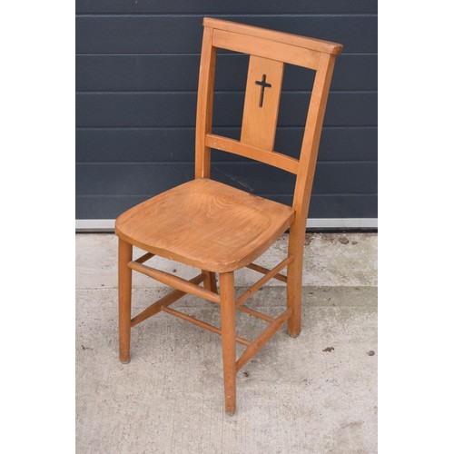 320 - 8 mid 20th century pine chapel chairs with a crucifix shape in the back. 86cm tall. Each in good fun... 