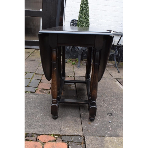 330D - Wooden 20th century priory style drop leaf dining table together with 4 spindle back chairs. In good... 