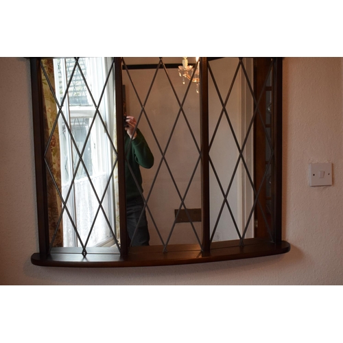 330F - A 20th century wooden mirror with Tudor style/ diamond shaped design. 95 x 74cm. In good condition.