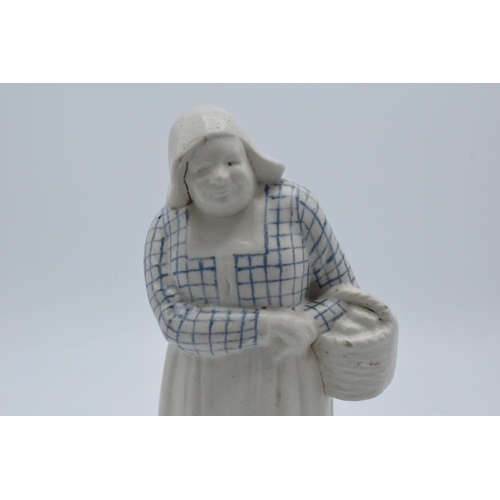 132 - Doulton Lambeth stoneware figure of a Dutch woman with basket, H3. In good condition with no obvious... 