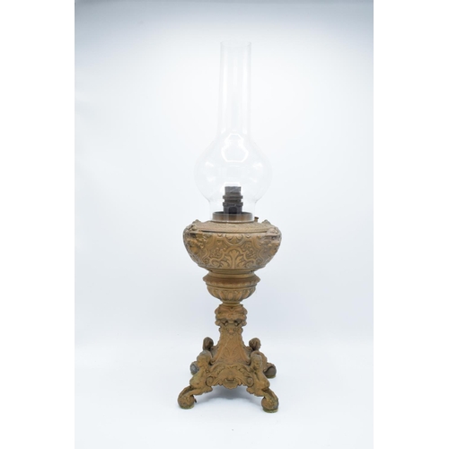 296 - Victorian cast oil lamp base converted to electric with shade. in need of re-wiring, 35cm tall witho... 