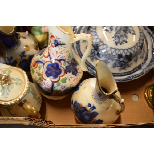 14 - A collection of 19th century Staffordshire pottery to include Mayers jugs, Toby jugs, Moultan tureen... 
