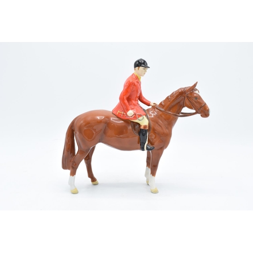 165A - Beswick Standing Huntsman 1501 in a chestnut colourway (overpainted). In good condition with no obvi... 