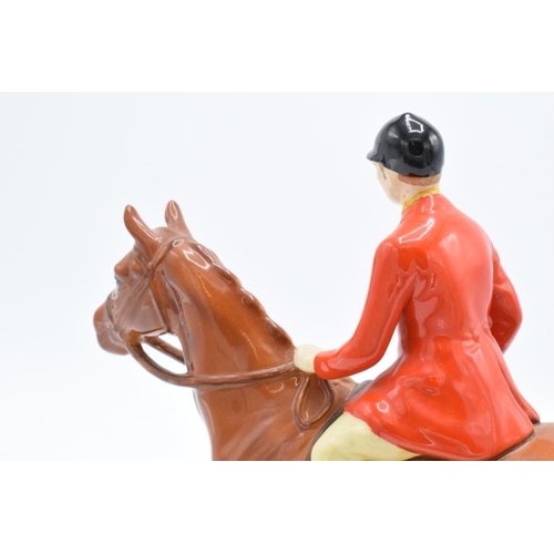 165A - Beswick Standing Huntsman 1501 in a chestnut colourway (overpainted). In good condition with no obvi... 