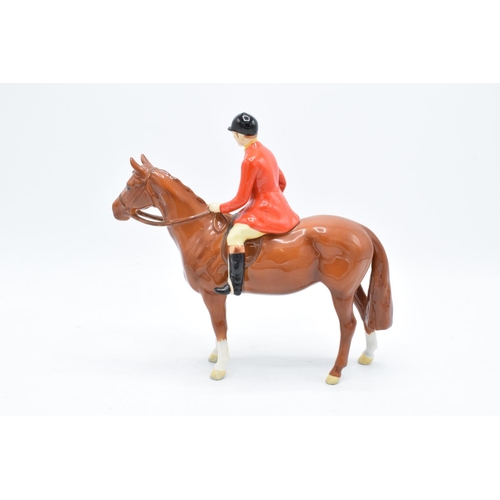 165A - Beswick Standing Huntsman 1501 in a chestnut colourway (overpainted). In good condition with no obvi... 