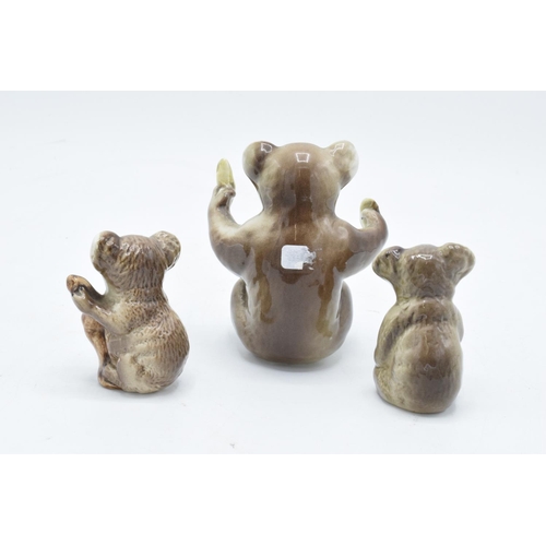 167 - Beswick Koala Bears to include koala eating fruit 1089, bear on branch 1039 and similar 1040 (3). In... 