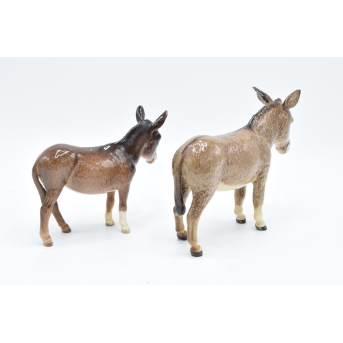 170 - Beswick pair of donkeys (2). In good condition with no obvious damage or restoration. 13.5cm tall.