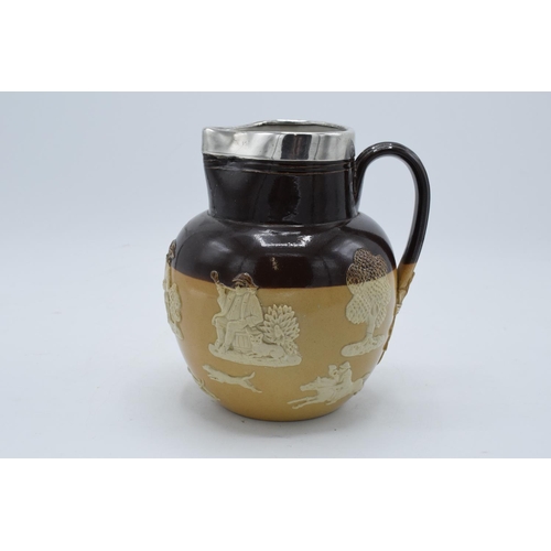 190 - Royal Doulton stoneware jug decorated with harvest scenes and a hallmarked silver rim. In good condi... 