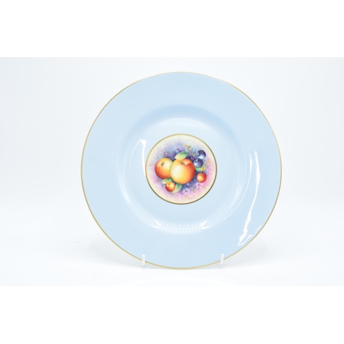 195 - A Royal Worcester 27cm diameter dinner plate with a fruit scene design surrounded by a light blue ba... 