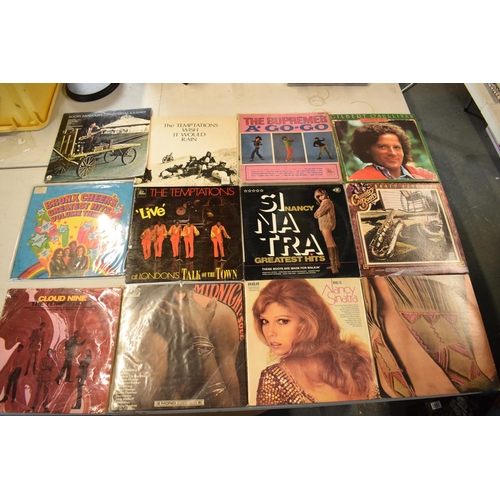 200 - A collection of LPs from a range of dates to include a variety of artists such as Nancy Sinatra, Roy... 