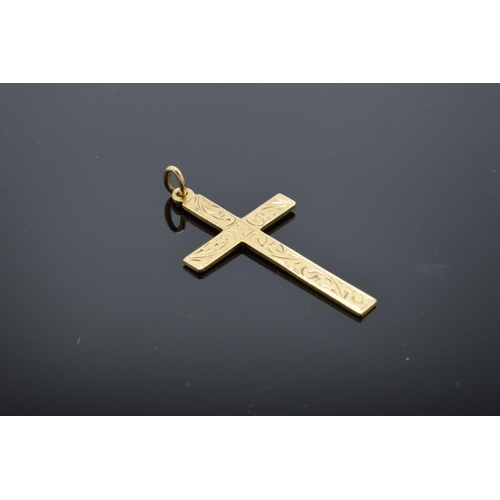 202 - A hallmarked 9ct gold crucifix pendant, 3cm in length. 1.2 grams.