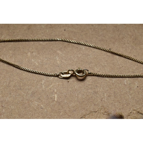 206 - A 9ct gold chain with hallmarks and stamped Italy 375, 1.4 grams. Approx 41cm in length.