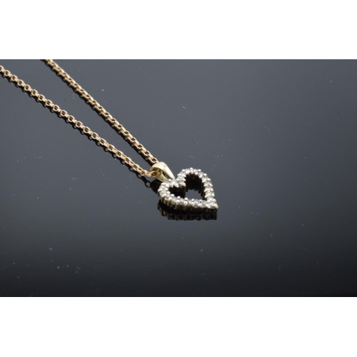 209 - A 9ct gold chain together with a 9ct gold heart-shaped pendant with semi-precious stones, gross weig... 