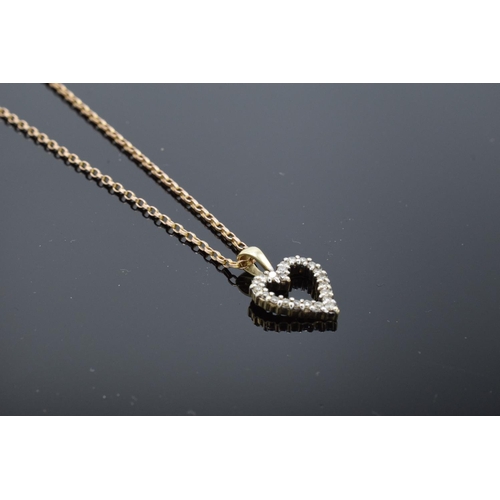 209 - A 9ct gold chain together with a 9ct gold heart-shaped pendant with semi-precious stones, gross weig... 