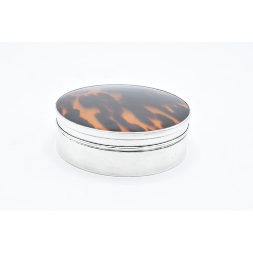 213 - A hallmarked silver ladies compact and mirror set complete with brush with tortoiseshell or similar ... 