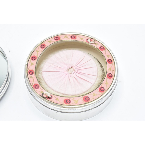 213 - A hallmarked silver ladies compact and mirror set complete with brush with tortoiseshell or similar ... 